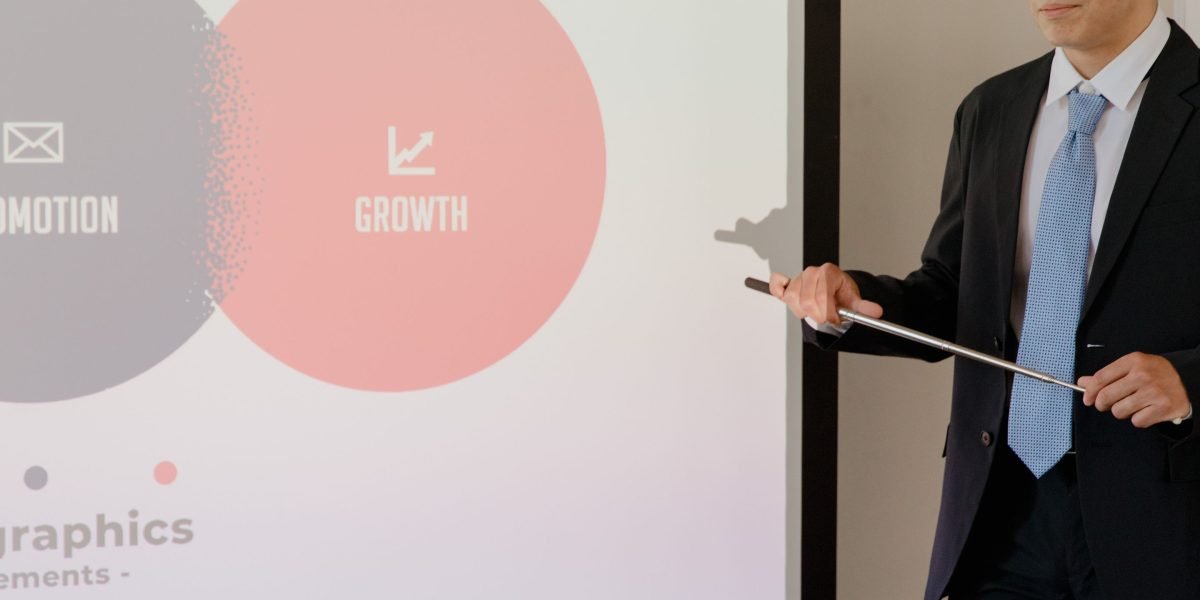 A professional presenting business insights to a group, symbolizing the positive outcomes of effective marketing strategies.
