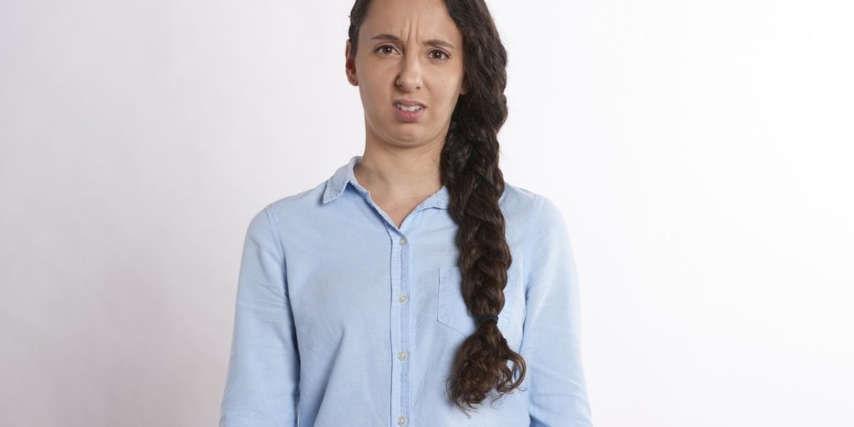 A person thoughtfully evaluating options, representing the careful consideration needed to avoid red flags when hiring an agency.