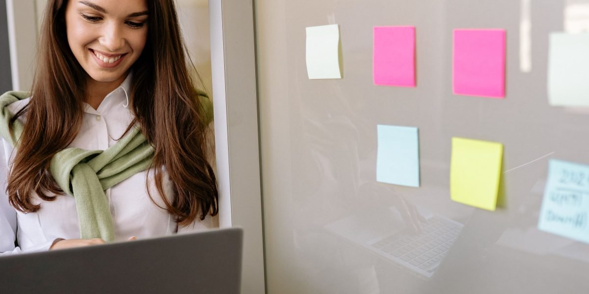 A professional contemplating strategies, embodying the proactive approach needed for real estate SEO in a competitive market.