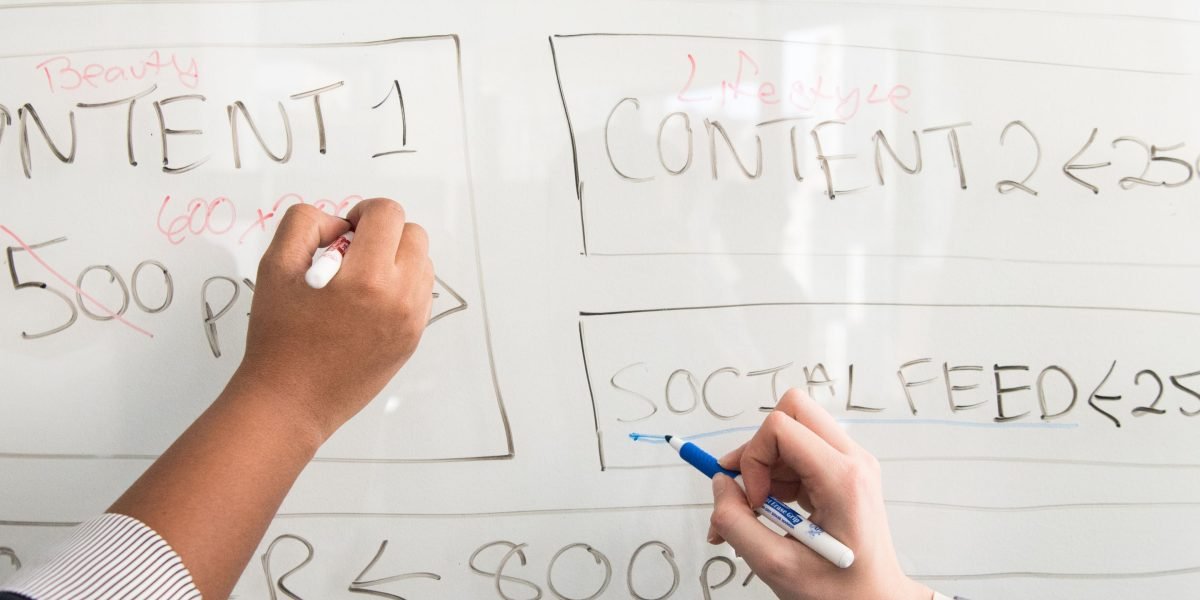 A person planning content structure using headings to organize information effectively for clarity and SEO.