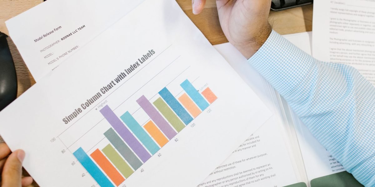 A professional analyzing performance data on a computer screen to optimize their SEO content marketing strategy.