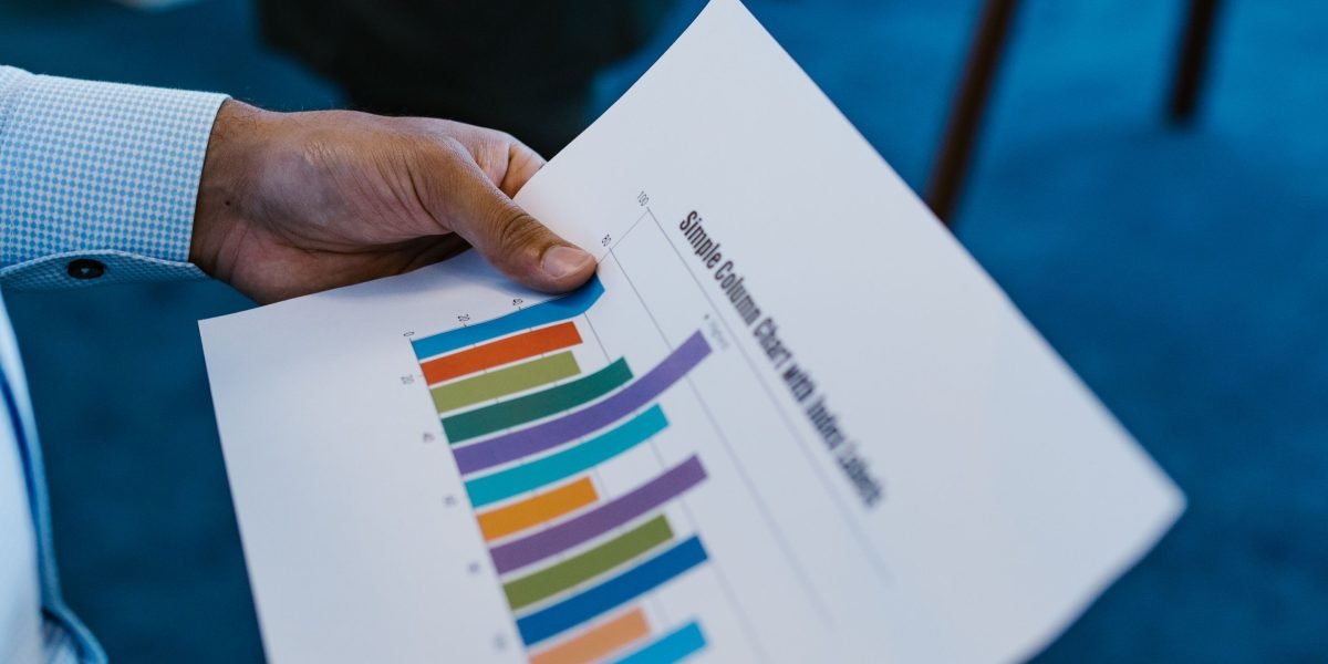 A professional reviewing a performance report, assessing SEO success.