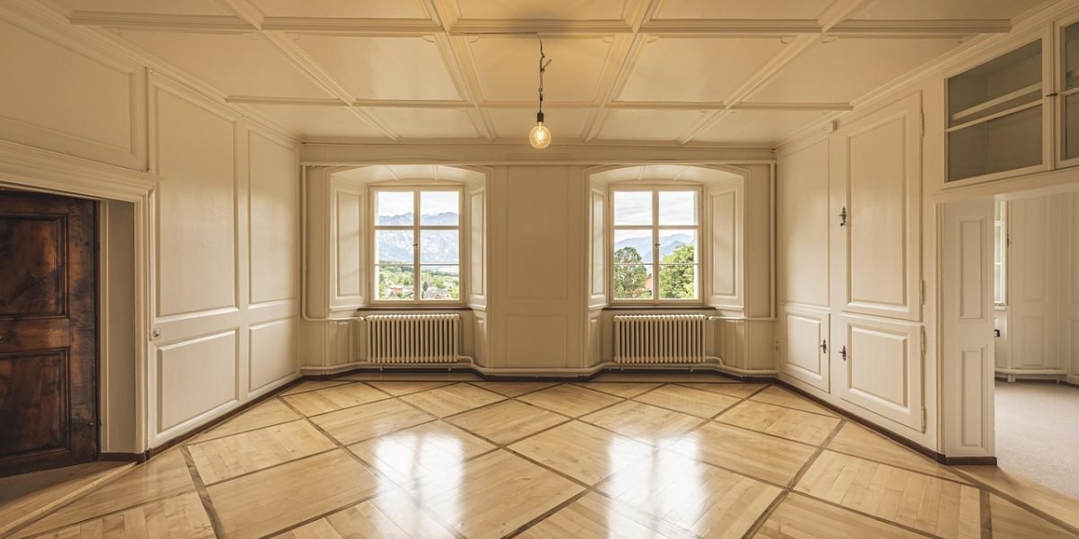 A real estate agent engages in a one-on-one discussion with a client, representing client interaction.