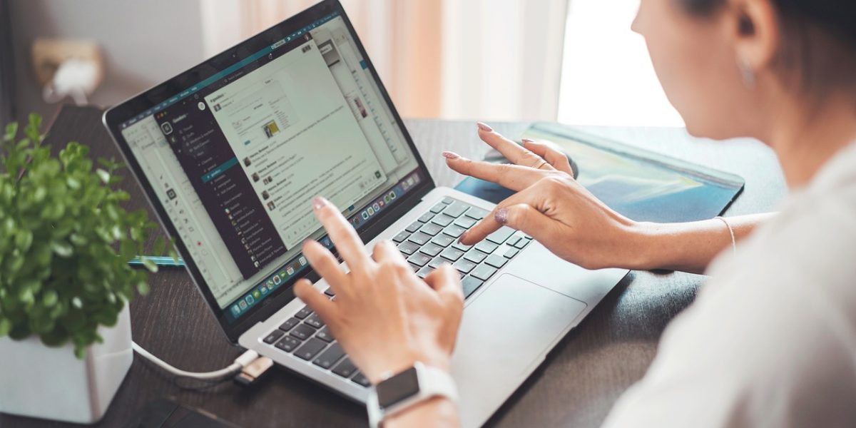 A person actively searching for property listings on a tablet or computer, reflecting modern buyer behavior.