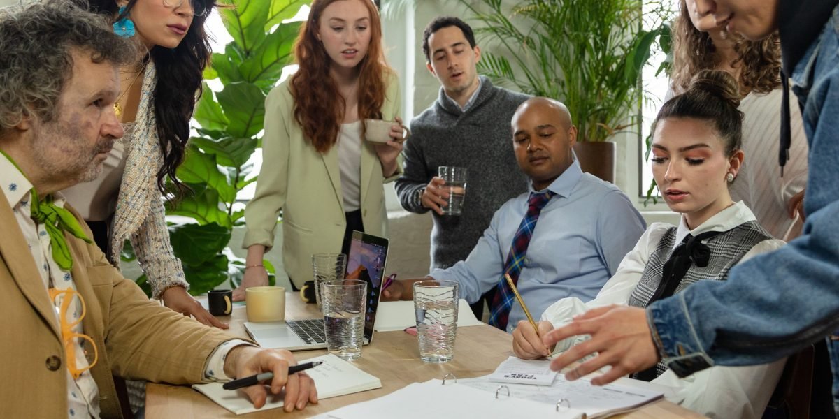 A diverse group of individuals collaborating, representing effective partnerships and community engagement in marketing efforts.