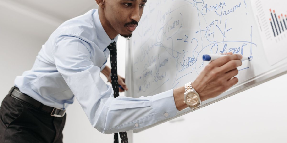 A person actively creating content, symbolizing the effort to develop valuable property guides and data-led insights.