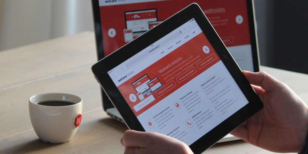 An agent diligently reviewing and optimizing website content to improve its visibility and ranking.